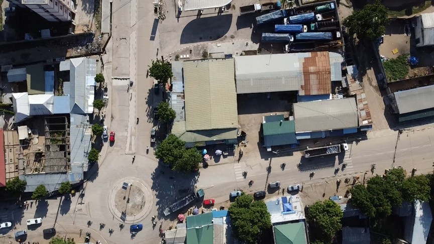 Aerial view of the road in Cameroon with people in the city