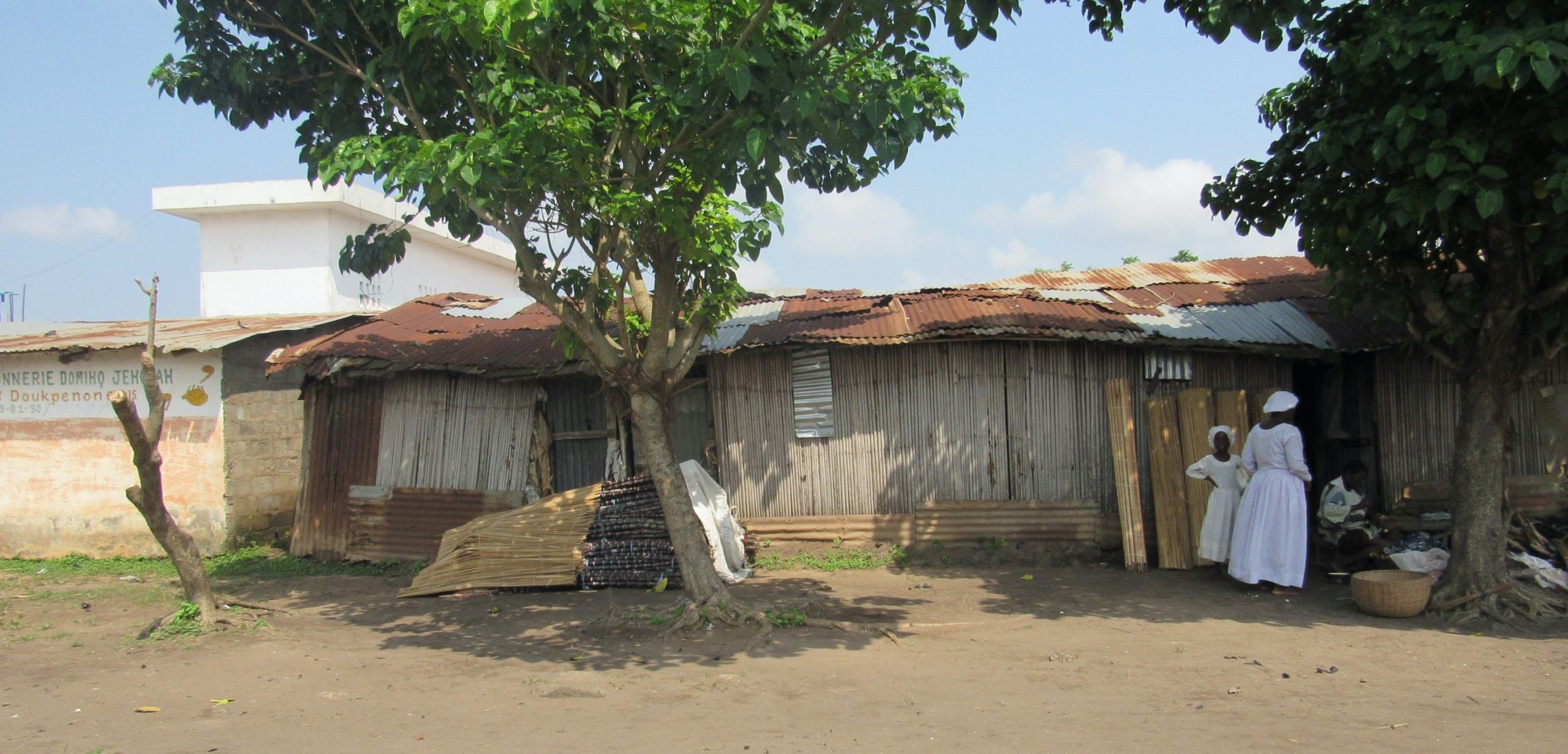 Infrastrcture in Porto-Novo in Benin with 3 people