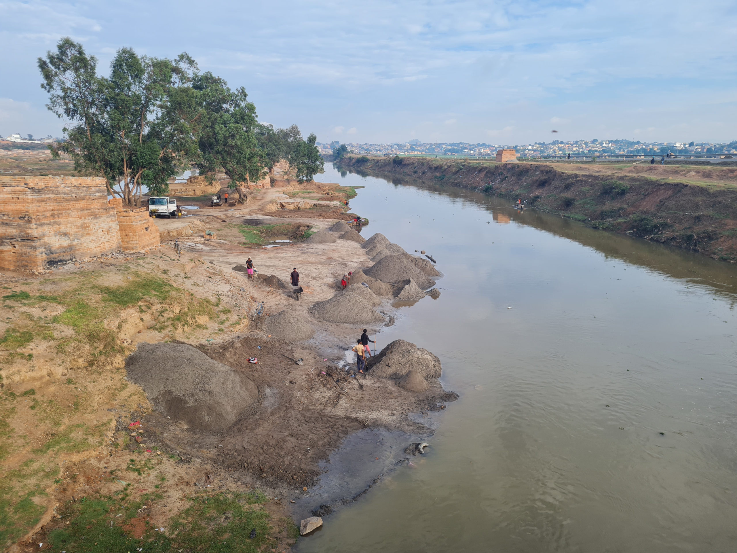 People fetching water from a river in Madagascar